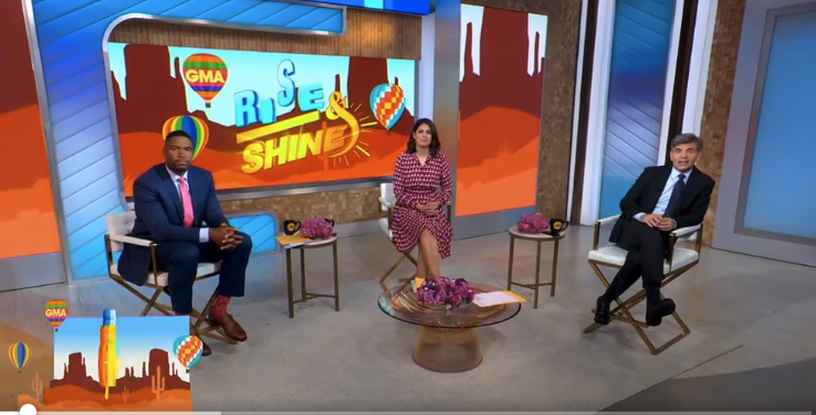 Good Morning America hosts in the studio with an Arizona hot air balloon graphic on screen